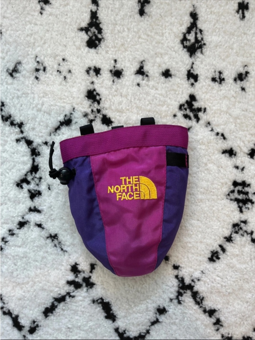 The North Face Purple and Pink Chalk Bag with Yellow Logo